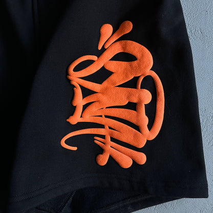 Conjunto Syna World Hood Black/Orange